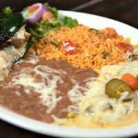 Poblano Al Carbon · Flame-roasted poblano stuffed with mesquite grilled chicken and monterey jack cheese, sundan...