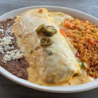 Burrito De Gonzalez · Filled with picadillo beef and rice, topped with choice of queso, house made Texas chili or ...
