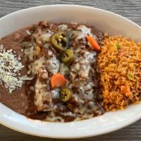 Lopez · 2 cheese enchiladas topped with house made Texas chili, served with beans and rice.