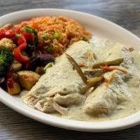 Spanish Style Tacos · Simmered, skinless chicken breast in (2) house made stone-ground corn tortillas with fresh g...