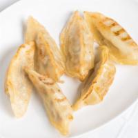 Gyoza (6) · Pork dumplings steamed or fried with sweet garlic sauce.