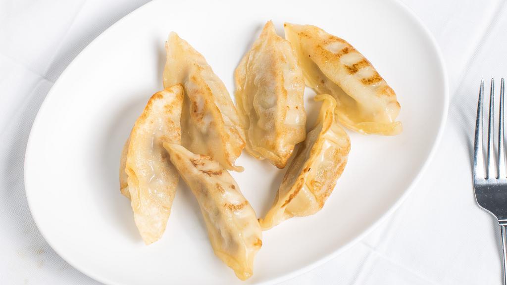 Gyoza (6) · Pork dumplings steamed or fried with sweet garlic sauce.