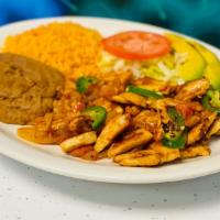 Pechuga A La Mexicana / Mexican Style Chicken Breast · Pechuga de pollo guisada con chile, tomate y cebolla servida con arroz y frijoles. / Grilled...