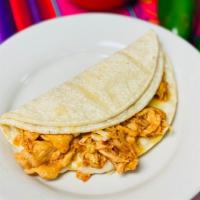 Quesadilla Chica / Small Quesadilla · Pequeña Quesadilla en harina o tortilla de maíz llena de su elección de carne y queso derret...