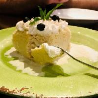 Latin Bites Tres Leches · Home-made sponge cake infused in a tres leches baileys rum sauce.