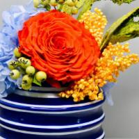 The Tori · The Tori brings color to another level. Rich blues from the porcelain vase enhance the prese...