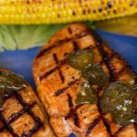 Bandera Pork Chops · with roasted corn on the cob, Two pork chops with a sweet & spicy jalapeno glaze (Gluten-Free)