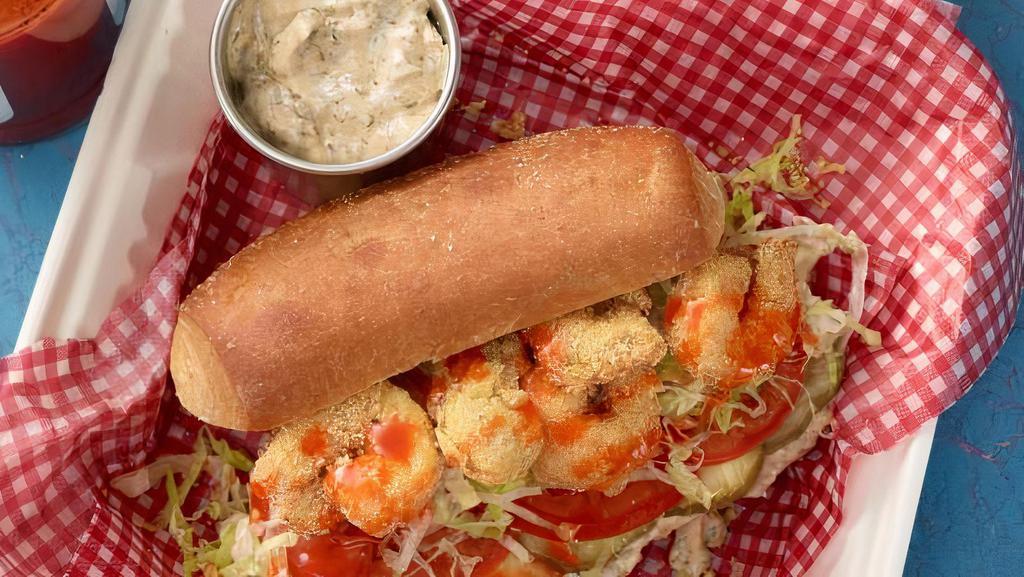 Po'Boy Combination (Shrimps & Oysters) · Shrimp, Oysters and Fries