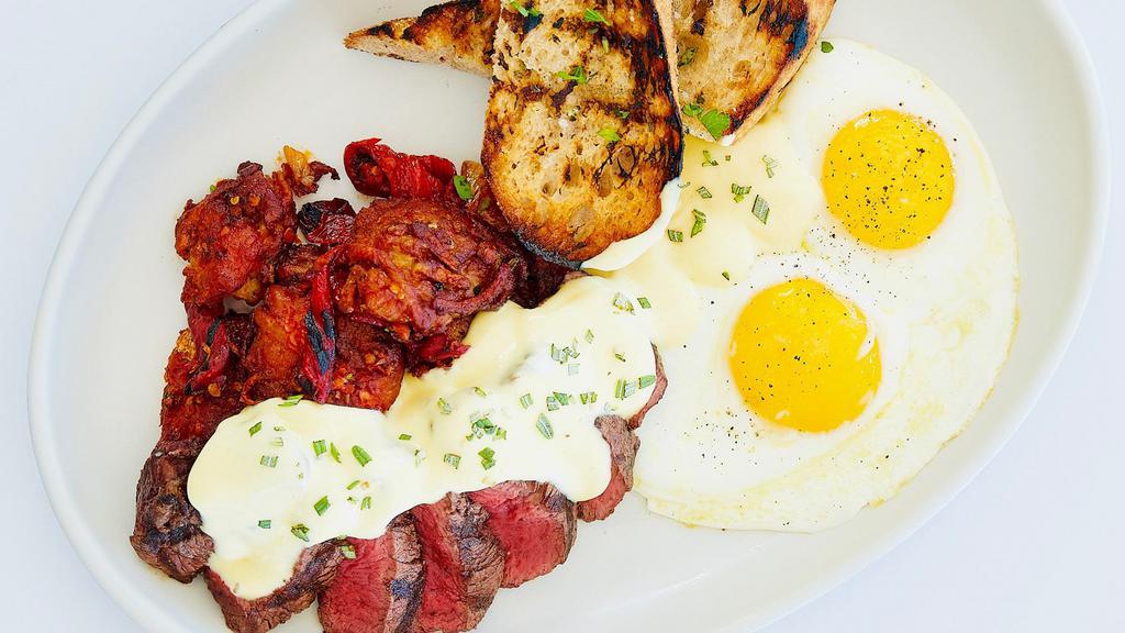 Grilled Beef Tenderloin & Eggs* · Sunny side up eggs, calabrian potato hash, rosemary bearnaise.