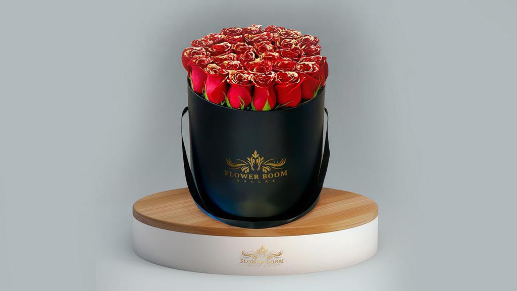 Red Roses Dipped In Gold · Red roses symbolize LOVE & Gold color symbolizes WEALTH. Send them to someone special and wish them love & wealth.

Roses are hand painted with flower safe paint.

Arrangement includes:
Fresh FbD Signature Hand-painted Red roses
FbD Medium box measured at 9.75