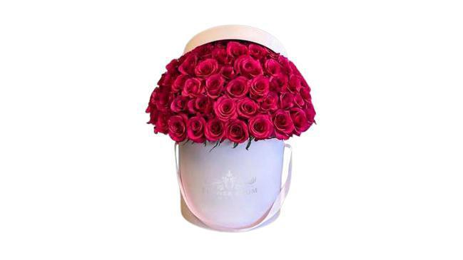 Fuchsia Roses In A Box · Fuchsia roses symbolize appreciation, gratitude, or thank you. Show them your gratitude with our Fuchsia rose arrangement.