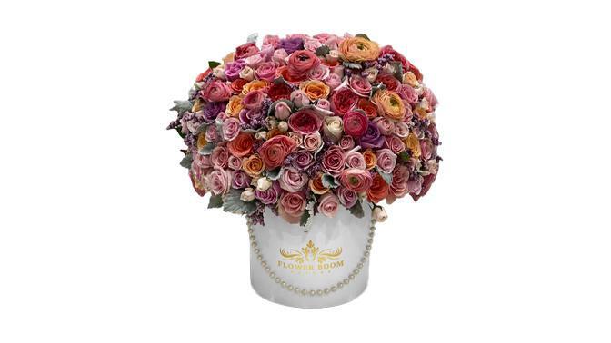 Mood Booster Colorful Roses · This colorful flower arrangement of different kinds of roses is gonna amaze anyone who receives it. For rose lovers this is a dream come true. Order now and make someone special happy today.