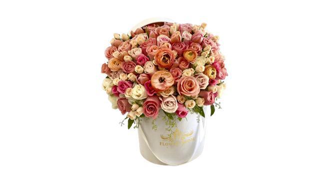 Caramella - Beautiful Roses · This colorful flower arrangement of different kinds of roses is gonna amaze anyone who receives it. For rose lovers this is a dream come true. Order now and make someone special happy today.