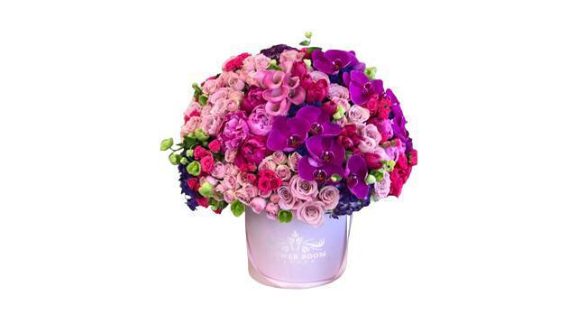 Candy House · This is literally a candy house of candy color purple & pink blooms! Absolutely stunning luxury arrangement made for your special ones! Make them feel unique. Luxury flower delivery is available in Dallas and whole DFW area.