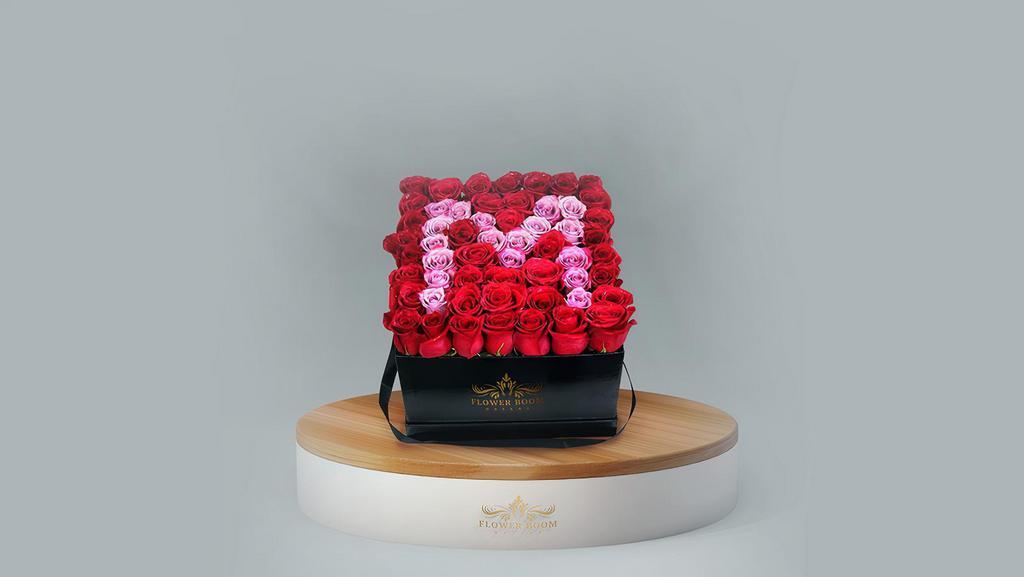 Monogram Initial Rose Box · Complete your unique style with our stunning customized monogram initial rose boxes. This modern design was constructed by our creative designers to make it special for the receiver. Red and purple roses are beautifully and carefully aligned next to each other creating a bed of roses on a single plane.

*** Please mention the letter and rose colors in 