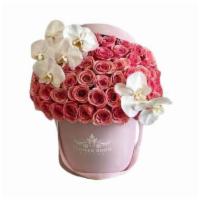 Geraldine Roses With White Orchid In A Box · Amazing combination of roses and orchids. These premium class Geraldine roses are looking ev...