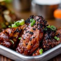 Chicken Wings · Choice of: Classic (Valentina hot sauce), Honey Sambal, Lemon Pepper (dry), Spicy Pickle (pi...