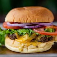 Impossible Burger (Vegetarian) · Plant-based Impossible Burger patty, American cheese, lettuce, tomato, red onion, shhh sauce...