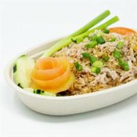 Crabmeat Fried Rice · Fresh crab meat stir-fried with jasmine rice. Caution may contain crab shells.