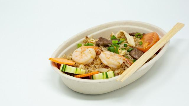 Combination Fried Rice · Stir-fried rice with chicken, beef, shrimp, onions, tomatoes, and egg.