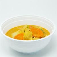 Yellow Curry · Gluten free. Potatoes, carrots, white onions, and bell peppers. Served with a side of jasmin...