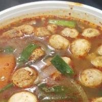 Tom Yum Soup · Gluten free. A spicy combination of herbs, mushrooms, tomatoes, cilantro, lemongrass, galang...