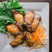 Sweet Rice Chicken Wings (6) · Seasoned chicken wings deep fried.