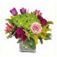 Lucky You · Send this sweet arrangement to your sweetie! Hydrangea, roses and tulips are arranged in a s...