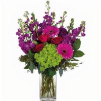 Lovey Deluxe · Share the happy with the deluxe version of our Lovey arrangement. Red roses, gerbera daisies...