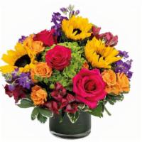 Lola Deluxe · Our Favorite Sunflowers, Ecuadorian Roses, Hydrangea and fragrant stock are delightfully arr...