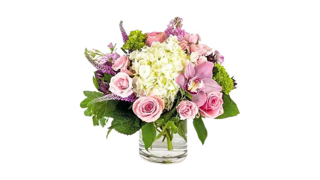 Honeybunch · Our Honeybunch is perfect for your honey bunch! White hydrangea, pink spray roses, lavender stock and a pink cymbidium are arranged in a clear glass vase.

Approx. 13.5