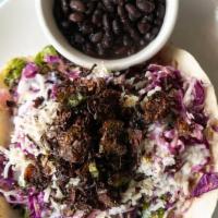 Vegetarian Tacos · balsamic roasted brussels sprouts, cabbage slaw, pickled red onion, creme fraiche & cotija c...