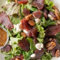 Apple Pecan Salad · organic spring mix, spinach, romaine hearts, red wine poached apples, tx goat cheese, candie...