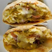 House Breakfast Tacos · open range eggs, all natural bacon & white cheddar cheese on flour or corn tortillas with ho...