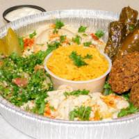 Vegetarian Plate · Served with rice, tabouleh salad, hummus, baba ganoush, domas, falafel, pita bread, and tzat...