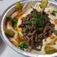 Hummus With Meat · Your choice of meat ( Gyro, Beef, or Chicken) on Hummus plate comes with pita bread.