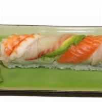 Rainbow Roll · Crab meat, avocado, cucumber, tuna, yellowtail, salmon, white fish, and shrimp.