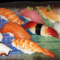 11 Kind Of Sushi · Tuna, yellowtail, salmon, shrimp, white fish, octopus, eel, mackerel, squid, surf clam and s...