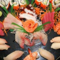 Shogun Love Boat · For three people. Fifteen pieces of premium sashimi, twelve pieces sushi, rainbow roll, and ...