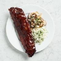 Bbq Back Ribs (Full) · Tender pork, braised low and slow, with warm potato salad, smoky bacon, coleslaw