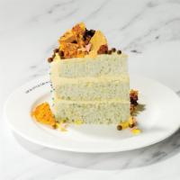 Celebration Cake · Triple-layered white confetti cake, salted toffee buttercream, honeycomb snaps, crisp pearls