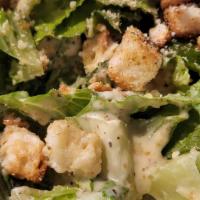 Caesar Salad · Romaine lettuce, parmesan, homemade
croutons, tossed with Caesar dressing