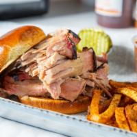 Pulled Pork · Pulled Pork available hot and ready to serve or fully smoked then chilled to serve at a late...