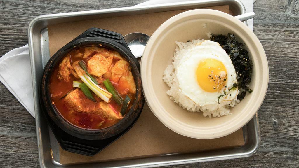 Soon Doo Boo Jjigae · Spicy soft tofu stew made with assorted seafood, onions and small white mushrooms.