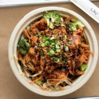 Spicy Chicken Bulgogi Bowl · Rice topped with Korean marinated spicy chicken, carrot, onion, broccoli and cabbage.fried egg