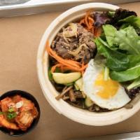 Bibimbop · Rice topped with carrots, cucumbers, bean sprouts, spring mix, zucchini, roots, pan fried eg...