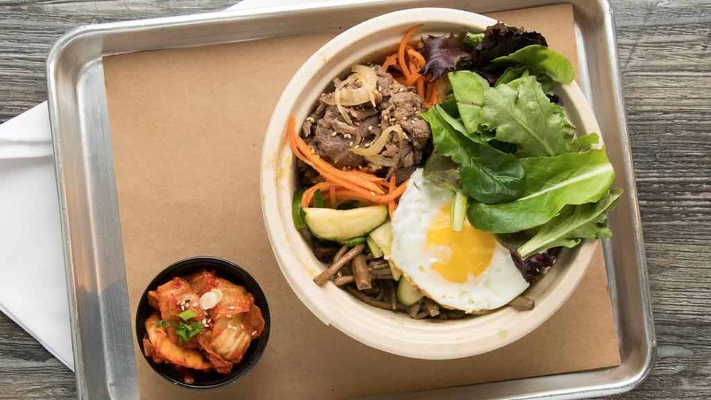 Bibimbop · Rice topped with carrots, cucumbers, bean sprouts, spring mix, zucchini, roots, pan fried egg and house spicy red sauce, with a choice of beef, chicken or tofu.