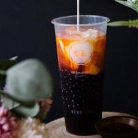 Thai Milk Tea · Freshly brewed Thai tea complimented by the creaminess of milk and half-and-half cream for a...