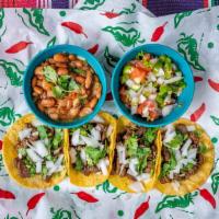 Plaza Tacos  (4 Mini Tacos) · Choice of diced steak asada or shredded chicken guisado on corn tortillas add cilantro add o...