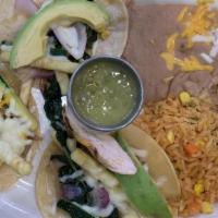 Veggie Tacos · Soft corn tortilla topped with sautéed garlic, spinach, onions, bell peppers, cheese, cilant...
